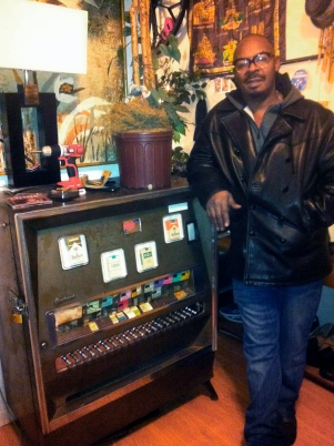 Robinson stores the profits from his no-questions-asked retail store inside an antique cigarette machine in his apartment.